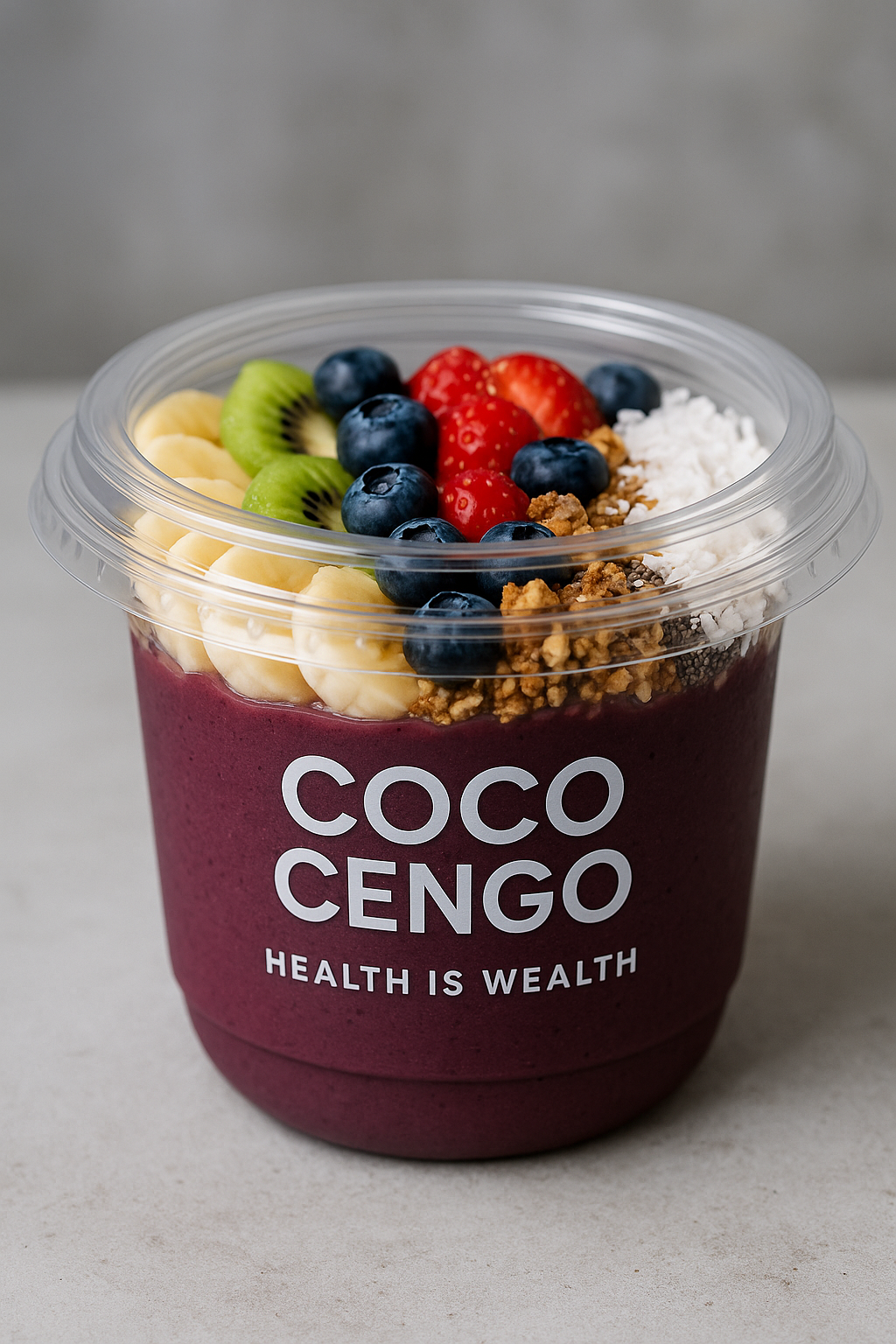 Schüssel mit Acai Bowl und Obst mit dem Aufdruck Coco Cengo Health is Wealth